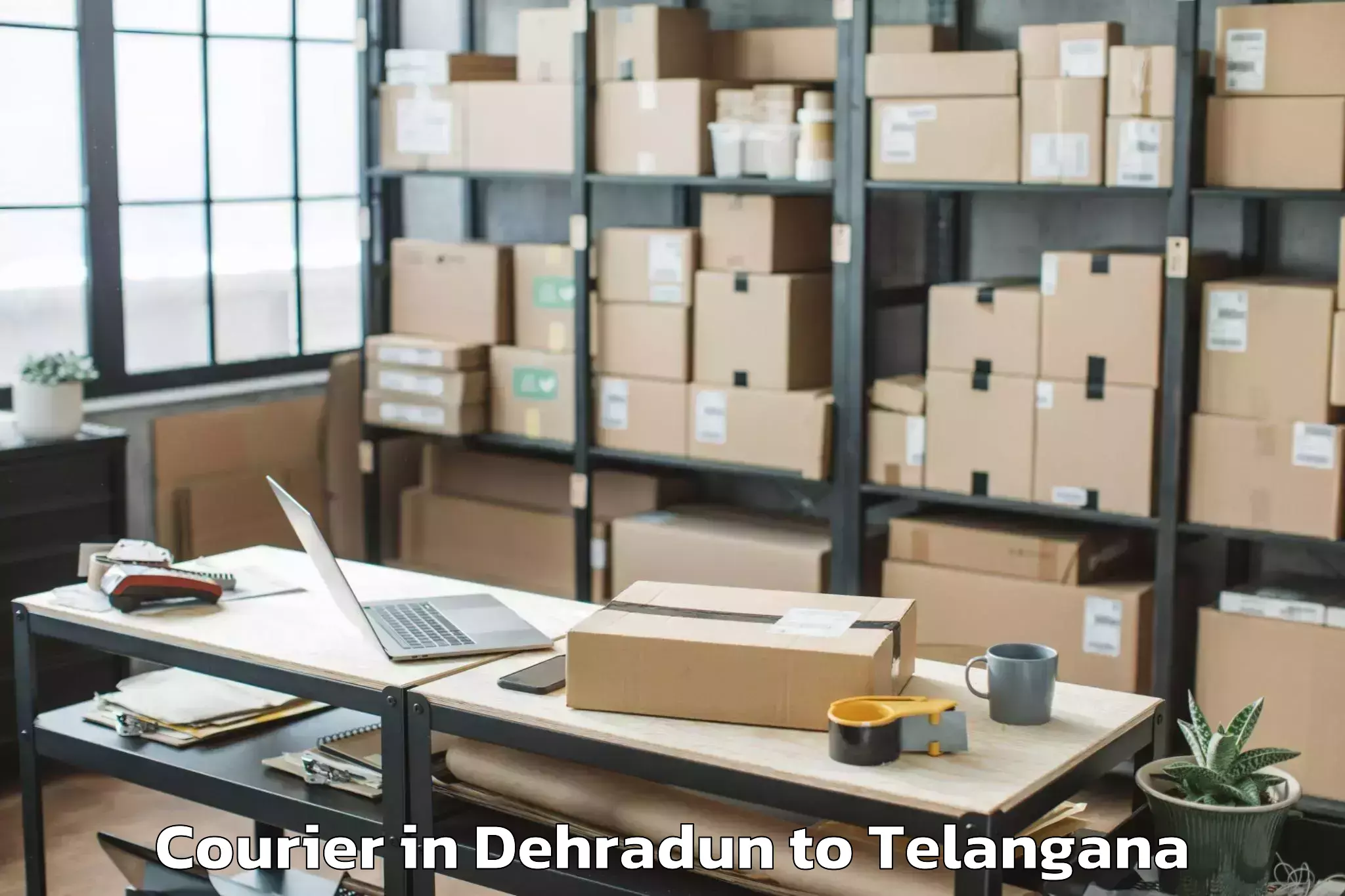 Book Your Dehradun to Nadigudem Courier Today